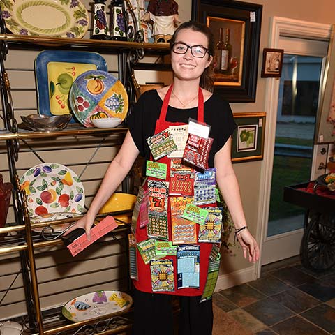 Kayla Neary modeling the Lottery Apron, a big hit in the silent auction