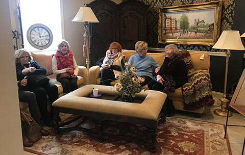 Ladies from the American Association of University Women meet at Design Consign to learn about how the consignment shop benefits victims of domestic violence.